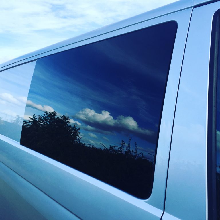 Fixed side glass installed on a VW T5, illustrating the fixed-pane style